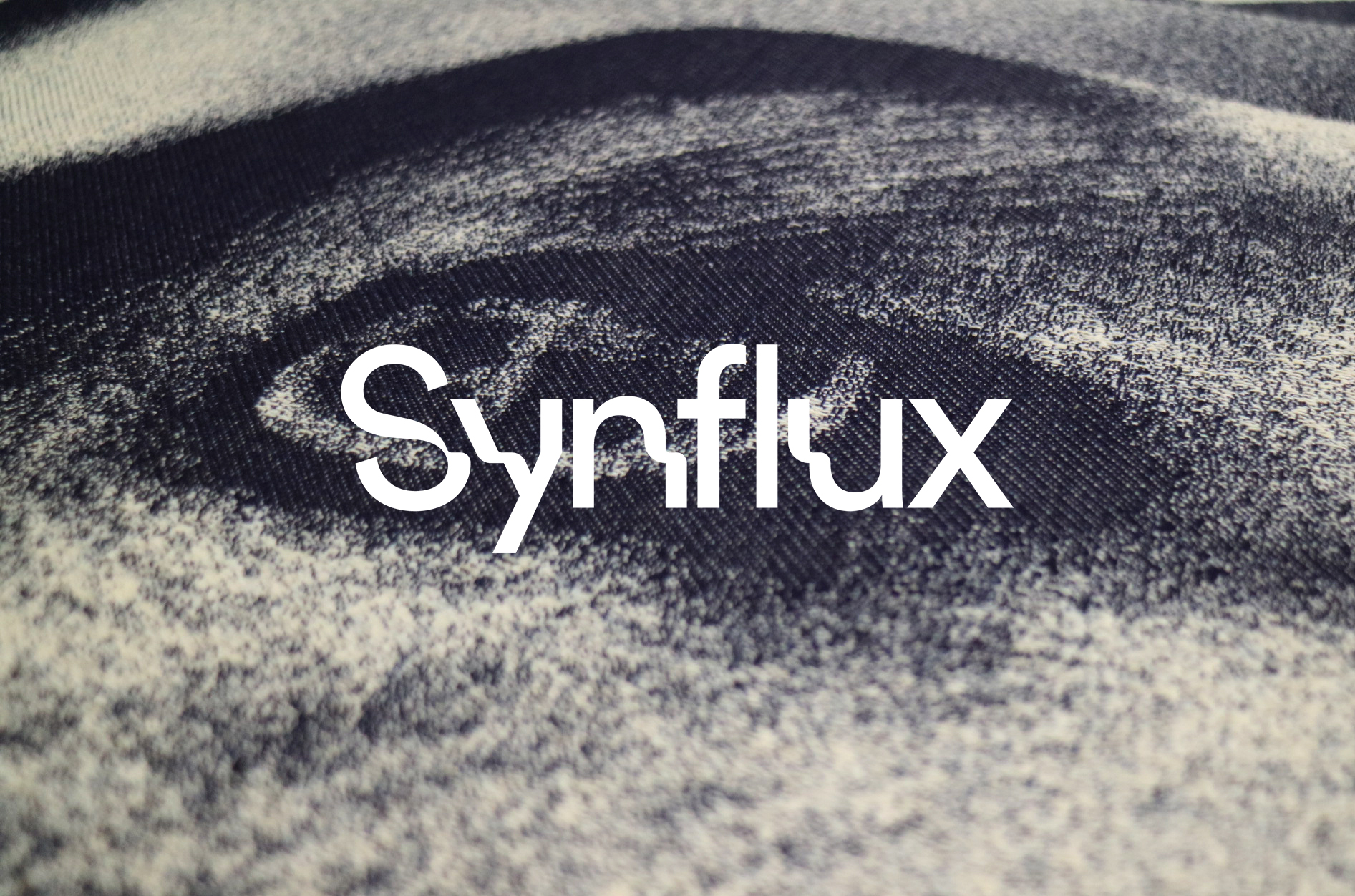 Synflux raises $1.7 million in January 2025. A featured image showing the Synflux logo, indicating the article is related to the company and its fundraising.