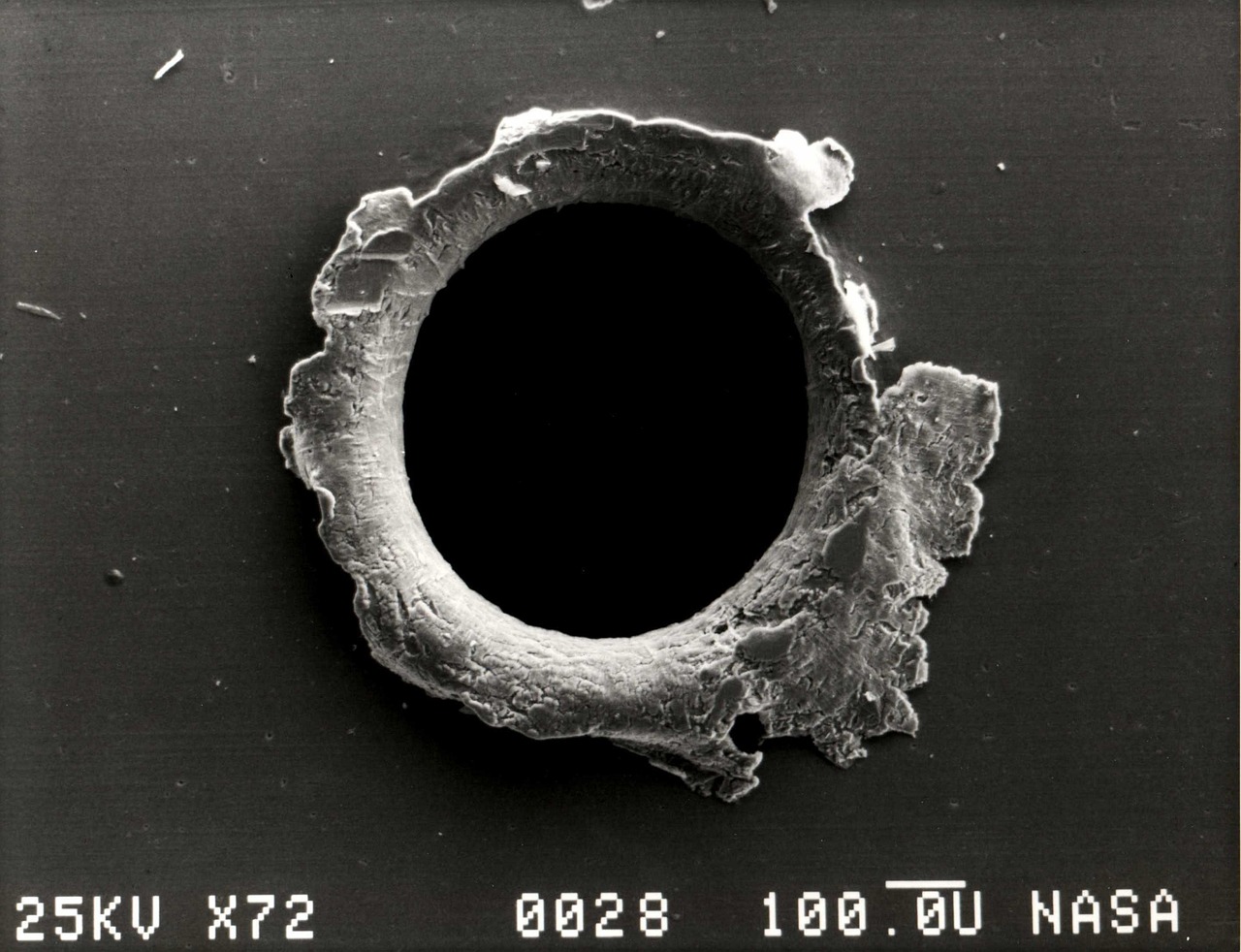 Power Laser Technology raises $7.5m. A photograph of a hole punched by space debris, identifying this as an article relating to the company.